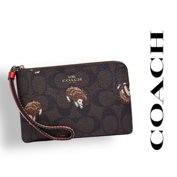 Coach Bags Coach Corner Zip Wristlet In Signature Canvas With